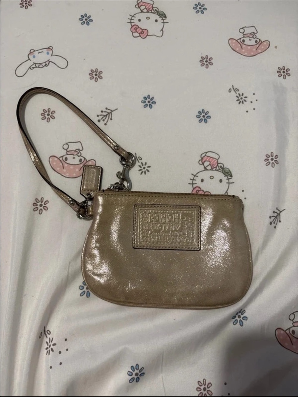 Coach poppy Metallic Champagne Wristlet